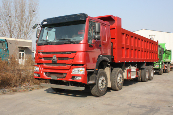 autocarro con cassone ribaltabile resistente rosso di Sinotruk Howo 8x4 delle ruote 50T 12 con 30M3 capacità LHD