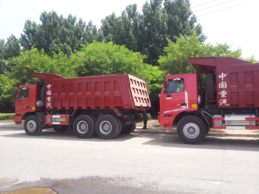 Sinotruk 6x4 10 spinge l'autocarro a cassone pesante di estrazione mineraria dell'autocarro con cassone ribaltabile 70T 30M3 LHD 371hp