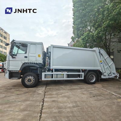 HOWO camion spazzatura Compattatore 4x2 Euro 2 Dispositivo rifiuti Riempitore posteriore di rifiuti camion verde diesel Modello nuovo