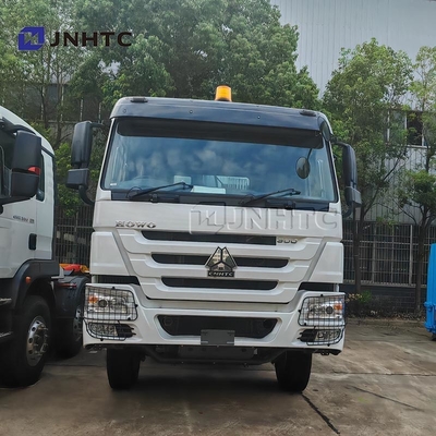 HOWO camion spazzatura Compattatore 4x2 Euro 2 Dispositivo rifiuti Riempitore posteriore di rifiuti camion verde diesel Modello nuovo