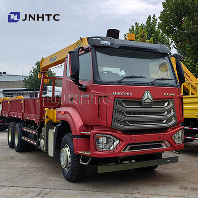 Knuckle Boom 8 Ton Hydraulic HOWO NX Cargo Flatbed Truck Monted Crane in vendita