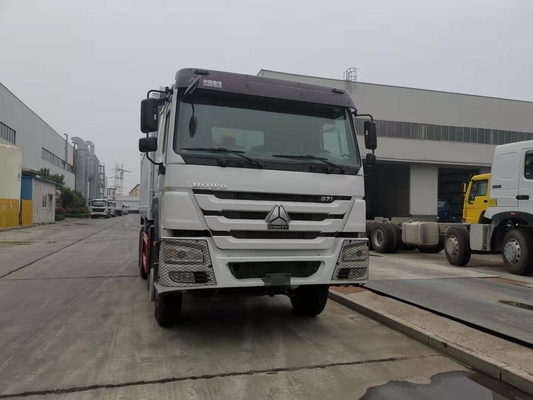 Autocarro con cassone ribaltabile resistente della ruota di Sinotruk 6x4 10 con il capovolgimento della piattaforma del corpo