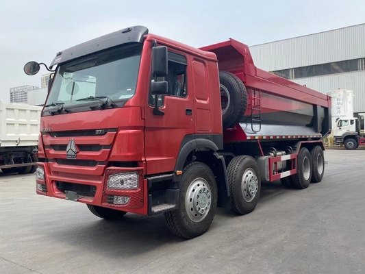 Camion della scatola dello scarico di forma di SINOTRUK HOWO 8X4 U nel Ghana Tanzania Zambia Zimbabwe