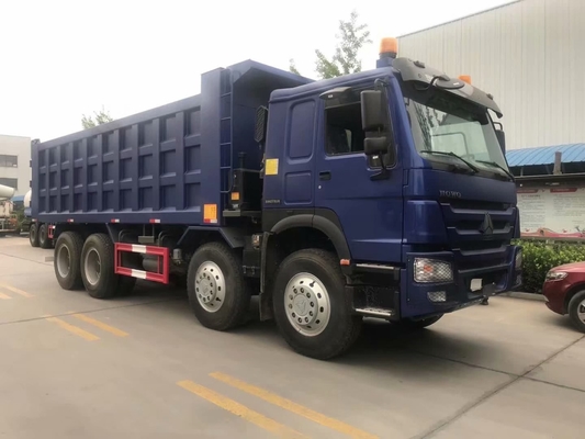 Camion della scatola dello scarico di forma di SINOTRUK HOWO 8X4 U nel Ghana Tanzania Zambia Zimbabwe