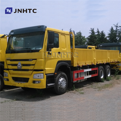 camion pesante a base piatta del carico di 6X4 371HP con il muro laterale