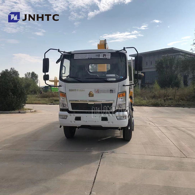 Il camion del carico della lamina piana ha montato Crane Sinotruk HOWO 4x4 tutto l'azionamento della ruota